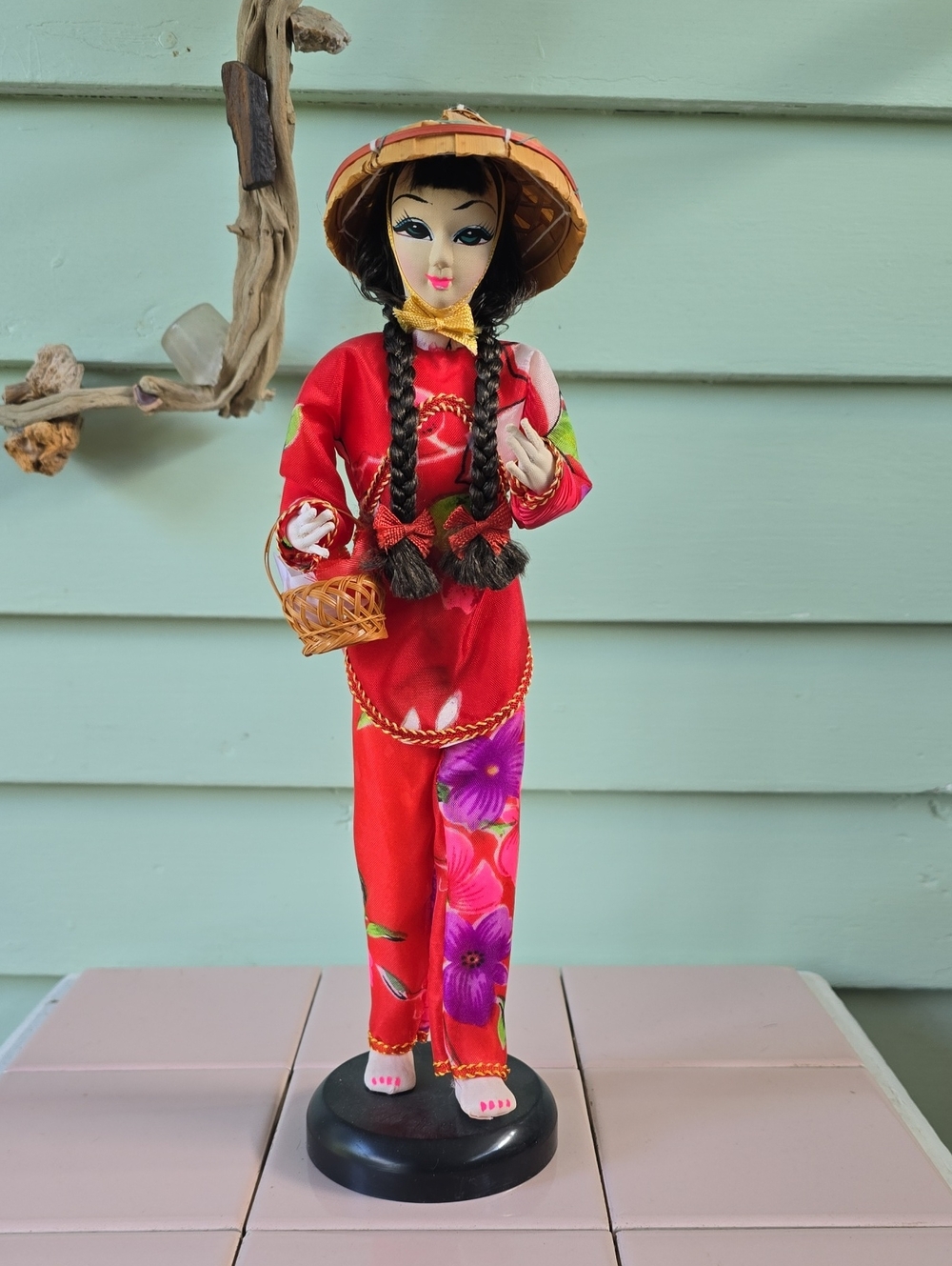 Porcelain doll in traditional Chinese attire